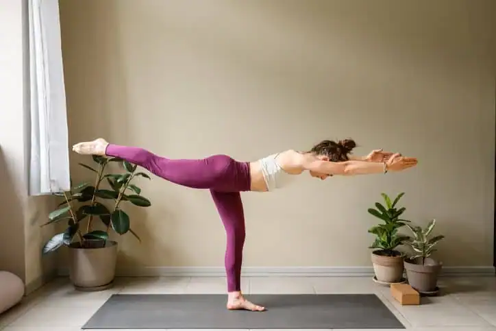 Achieving the Perfect Tone: How Often Should You Exercise for Results? 1 Woman doing Yoga exercise Southend-on-Sea to help with toning the body.